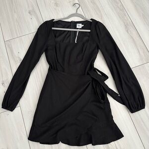 Black long sleeve dress for princess Polly is a size 8 was worn once